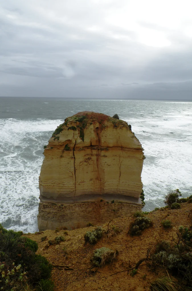 A limestone sea stack beside the coastal cliffs at the Twelve Apostles, Victoria, Australia